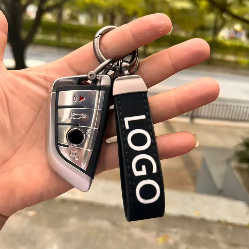 Customized Stylish Suede Keychains Unisex Retro Personalized Car Logo Keychains Fun Car Accessories Pure Color Buckle Suede Leather Material Car Logo Metal Key Chain Pendant