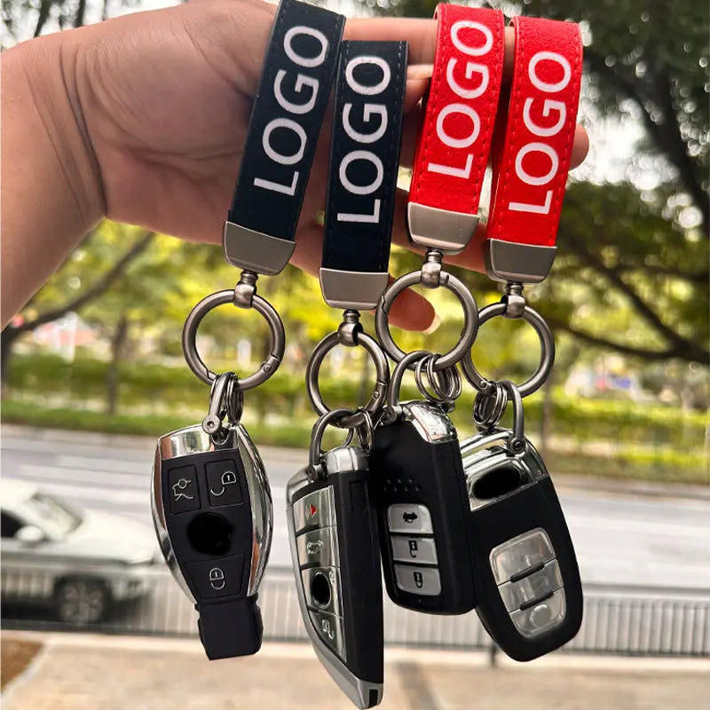 Customized Stylish Suede Keychains Unisex Retro Personalized Car Logo Keychains Fun Car Accessories Pure Color Buckle Suede Leather Material Car Logo Metal Key Chain Pendant