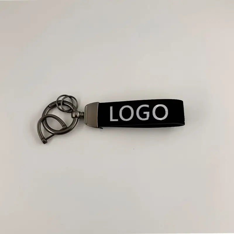 Customized Stylish Suede Keychains Unisex Retro Personalized Car Logo Keychains Fun Car Accessories Pure Color Buckle Suede Leather Material Car Logo Metal Key Chain Pendant
